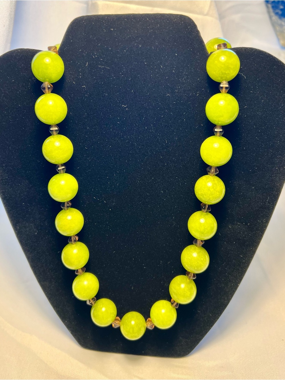 Olive Jadeite Necklace with light purple bicone crystal beads. 24” long, 153.3 g